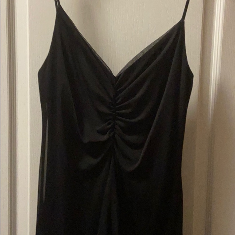 Black jump suit with sheer cover